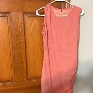 Sleeveless Pink Dress with gathered on side. Good condition. Small size